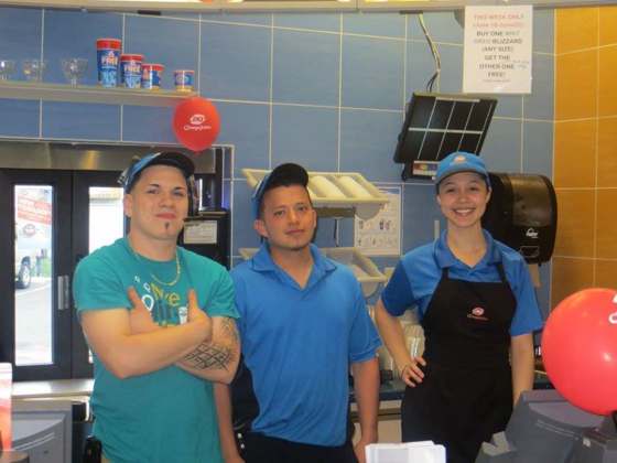 Three team members at a Dairy Queen counter
