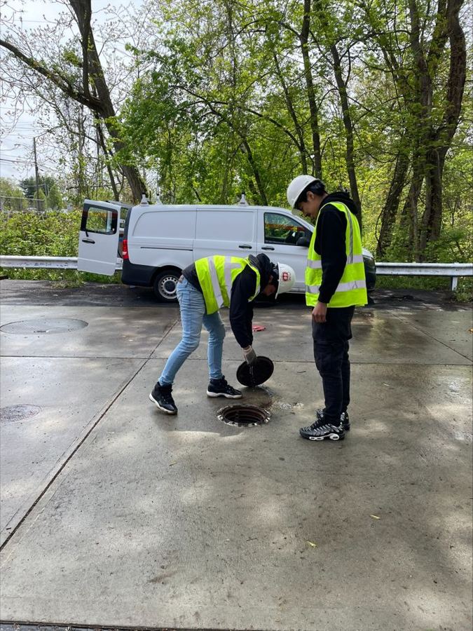 Shahani technicians servicing a tank manway