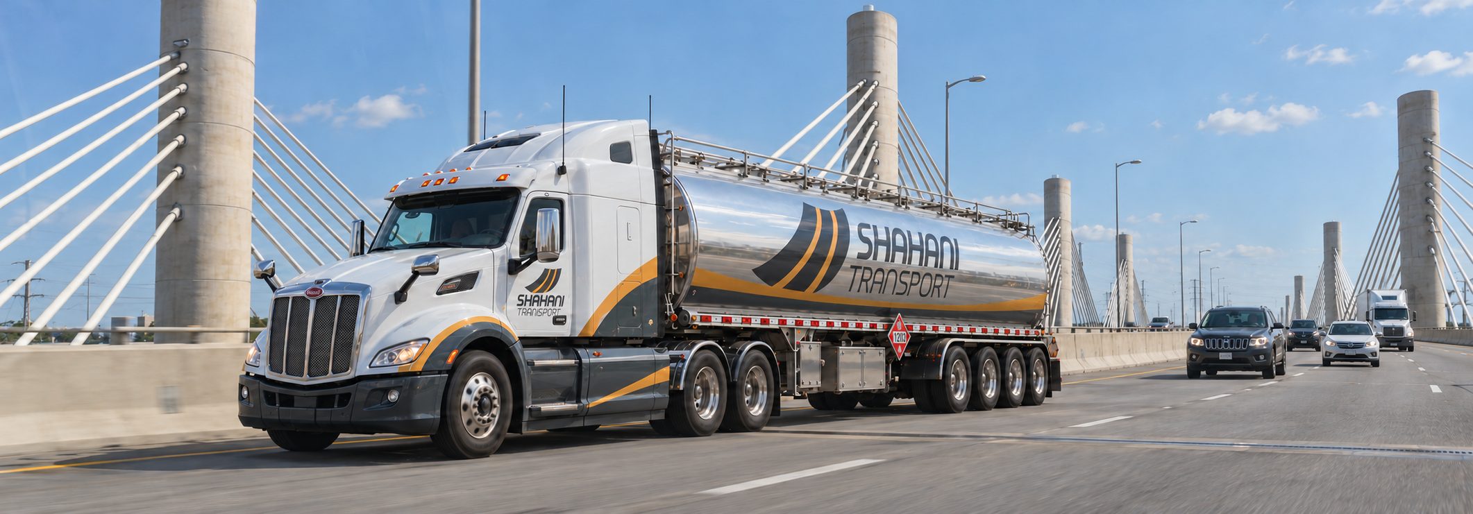 A Shahani Transport tanker truck crossing a cable-stayed bridge